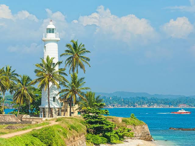 Historic colonial street inside Galle Fort with traditional buildings and cafés