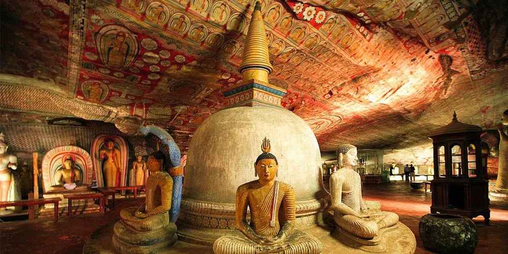 Golden Temple of Dambulla - Colossal 14-meter rock-cut reclining Buddha statue inside Cave 1