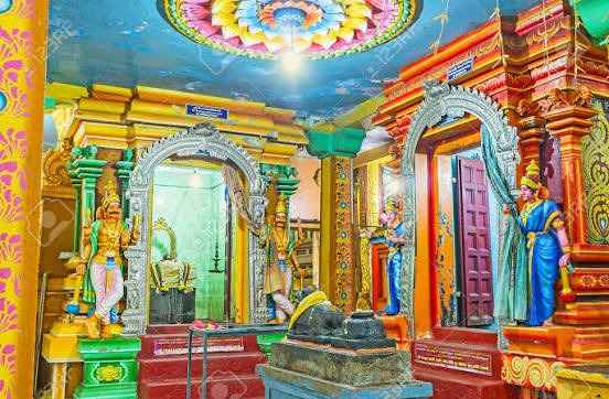 Interior pillared hall and colourful ceiling murals inside Matale Hindu Temple