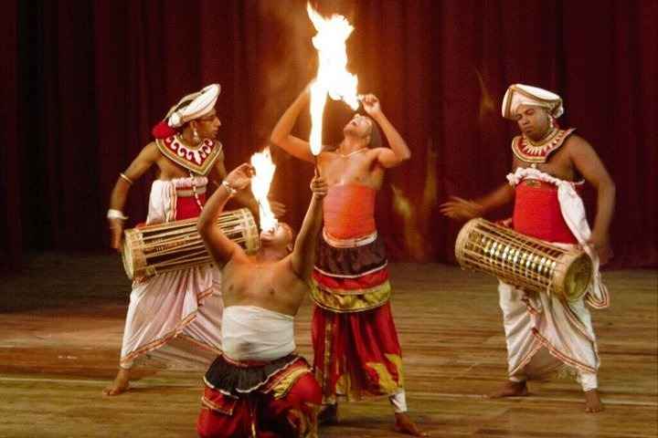 Spectacular fire acrobatics and fire walking during traditional dances of Sri Lanka show