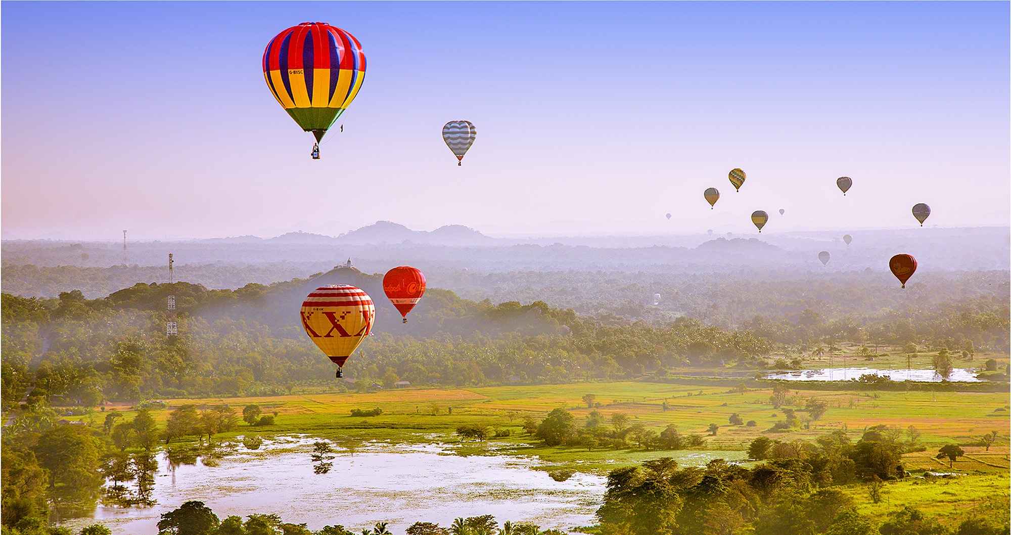 Hot air balloon burner inflation at dawn before liftoff in Sri Lanka