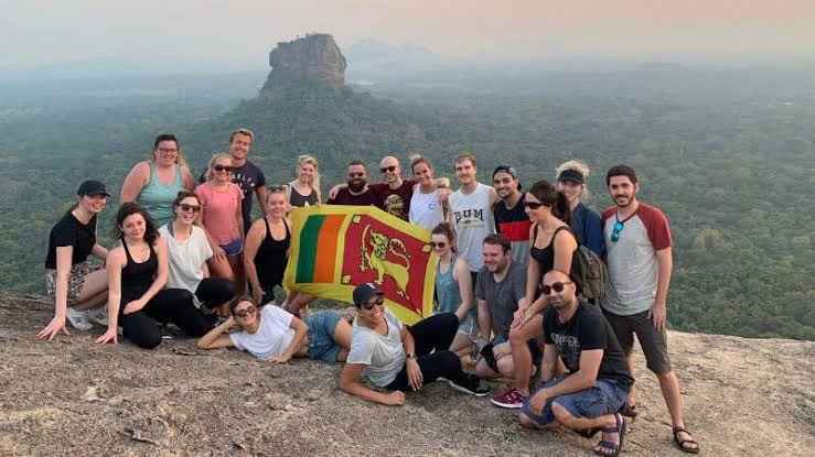 International tourists exploring cultural sites freely in Sri Lanka