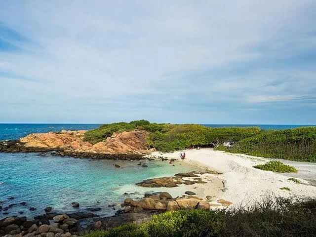 Aerial view of Pigeon Island Marine National Park turquoise waters and coral reefs near Nilaveli.