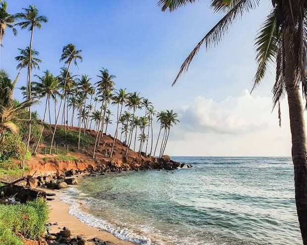 Scenic Coconut Tree Hill overlooking turquoise coastal waters in Mirissa Sri Lanka.