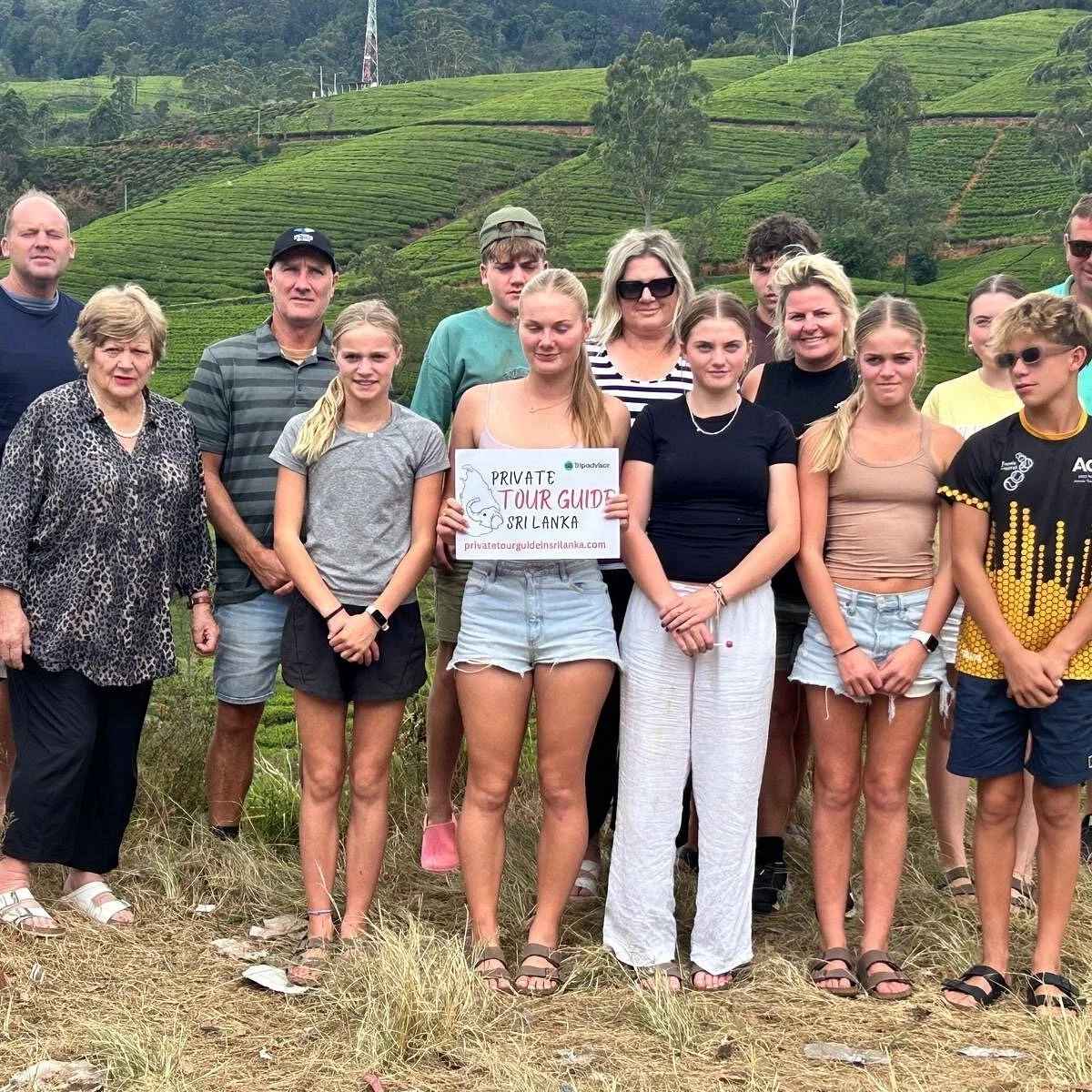 Chauffeur guide explaining local cultural customs to international travelers in Sri Lanka.