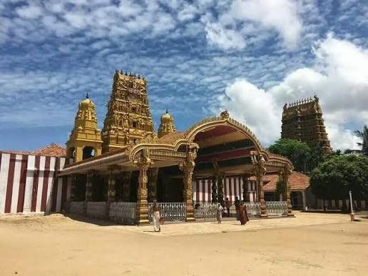 The majestic golden gopuram of Nallur Kandaswamy Kovil temple in Jaffna Sri Lanka.